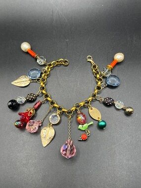 Multi-Color Charm Bracelet with Dangling Charm Accents